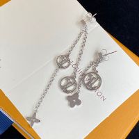 Louis Vuitton LV Circle Charm Pendant Asymmetric Earrings In Silver